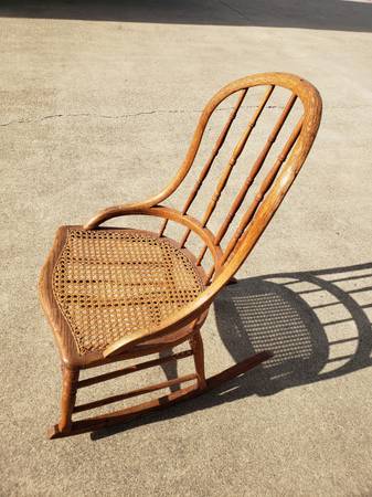 Antique wooden rocker with cane bottom 1