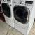 Front load LG washer and dryer square doors with pedestals 1 thumbnail