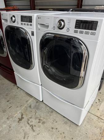 Front load LG washer and dryer square doors with pedestals 1