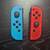 Blue (L) / Red (R) Nintendo Switch Joycons with new joysticks installed 1 thumbnail