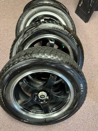 255-60-17Bridgestone Blizzak snow tires on wheels 1