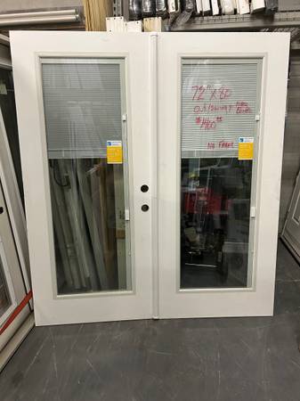 New impact French doors 72 x 80 with mini blinds inside $1400 1