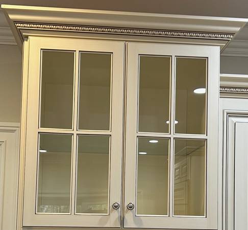 Glass front kitchen cabinets - each $175 1