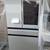Samsung bespoke 4 door refrigerator with family hub tv screen white in box 1 thumbnail