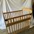 Compact wooden crib and mattress 3 thumbnail