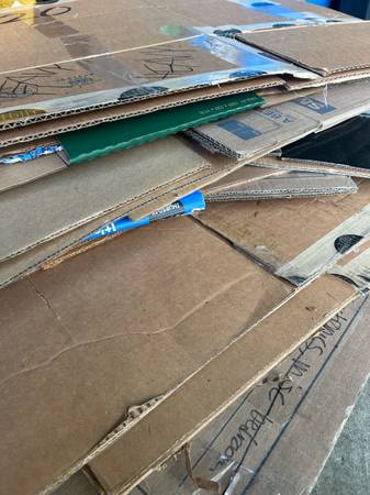 Used cardboard moving boxes and padding 1