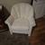 2 white chairs material identical 1 thumbnail