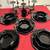 Black dishes plates bowls mug=$20 black multi candle holder=$25 1 thumbnail