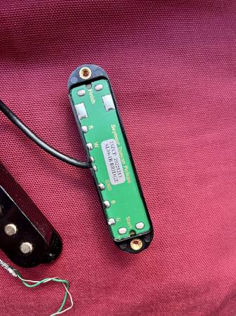 2 pastillas: DiMarzio y Seymour Duncan - $10063471466979329121
