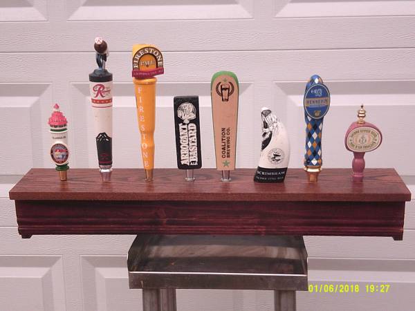 Bar Taps on a wood shelf 1