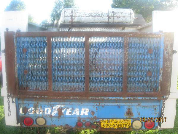 Tommy Lift off a tire service truck. 1