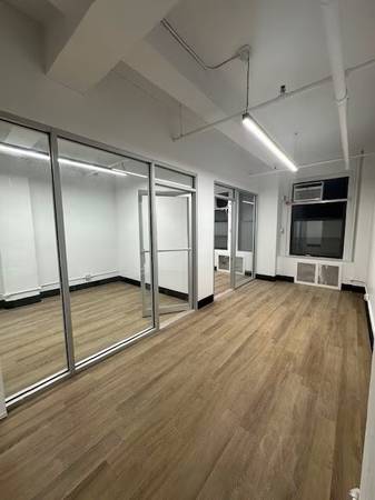 AMAZING OPEN OFFICE SPACE WITH PRIVATE GLASS OFFICES IN MIDTOWN WEST! 1