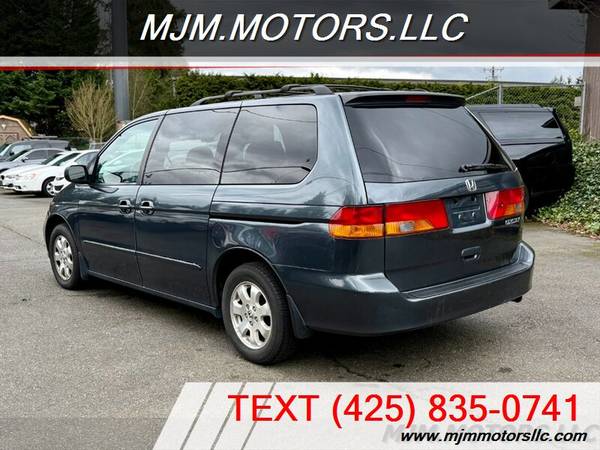**2004** HONDA ODYSSEY EX-L, ESPACIOSO, CONFIABLE Y LISTO PARA VIAJES POR CARRETERA! - $3.99563475588106627123