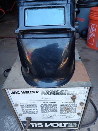 ARC WELDER with New welding helmet. 115Volts 100Amps 1