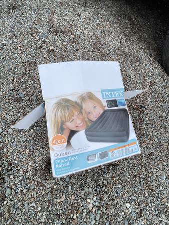 Intex Queen air mattress with pump 1