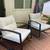 2 Black Wrought Iron Rockers with white cushions 3 thumbnail