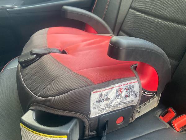 Car seat booster base in sporty red and black with cup holder 1