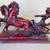 Large 23" maroon color sculpture of a Roman on a 2 horse chariot 1 thumbnail
