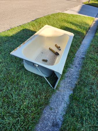 Steel bathtub & brass drian 1