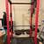 SOLD- Ethos power rack and Olympic bar with plates and mats 1 thumbnail