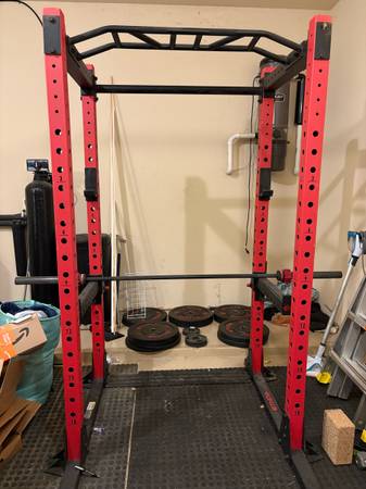 SOLD- Ethos power rack and Olympic bar with plates and mats 1