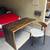 Square Roots Flo Desk + Matching Boma Chair | Seared Oak 1 thumbnail
