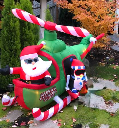Animated Light Santa & Penguin in Helicopter Inflatable, 5.5' 1