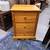 Solid Brazilian pine three drawer nightstand in a warm honey finish 1 thumbnail