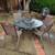 Round Glass Patio Table + 4 Woven Chairs 1 thumbnail