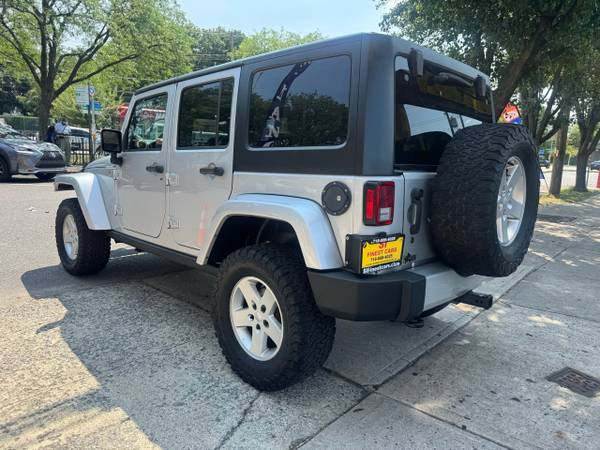2012 Jeep Wrangler Unlimited Sahara 4x4 - $12.995 (Staten Island)63476897576323124