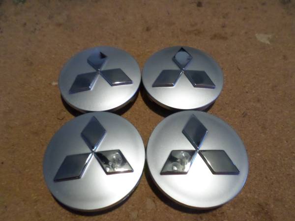 4 tapas para rin 60 mm Mitsubishi outlander 400 pesos 1