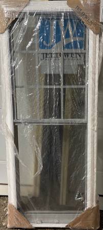 New 26x63 Premium JeldWen double hung window, 3x3 grids 1