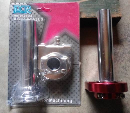 Throttle assembly , chrome and red anodize . 1