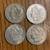 FOUR Morgan Dollars with different dates 1 thumbnail