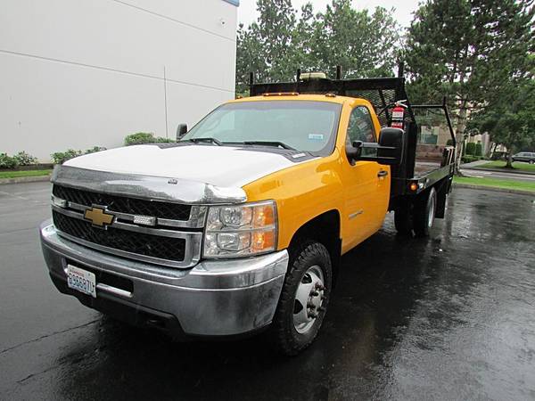 2012 Chevy Silverado 6.6 Diésel, cama plana, 4x4, solo 94 mil millas - $24995.0063472633054595122