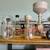 Glass wear. most of a case of jars with lids 1 thumbnail