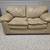 Tan leather loveseat 1 thumbnail