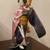 Japanese Geisha doll  wearing a pink  floral kimono with a golden fan 5 thumbnail