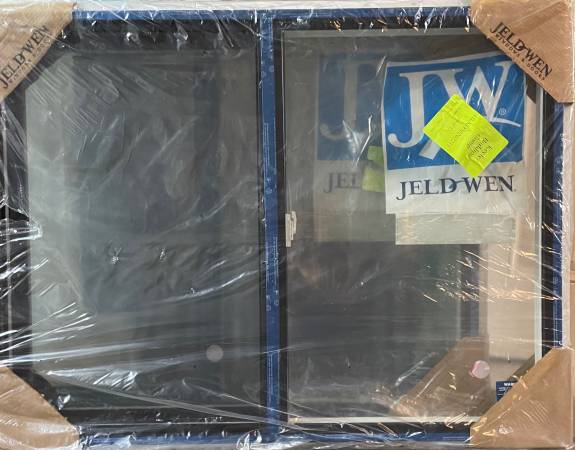 New 48x36 JeldWen sliding window, bronze 1