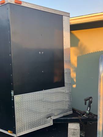 2016  6x10 enclosed v-nose trailer with ramp 1