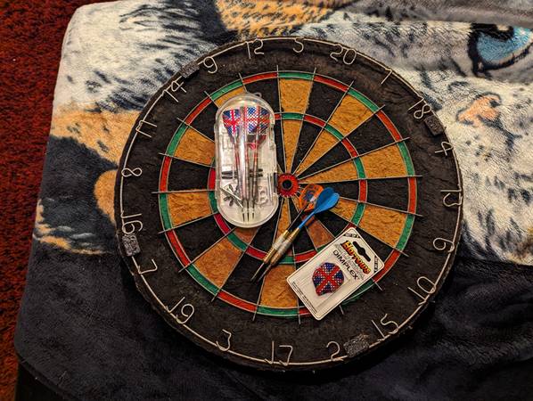 Dart board with darts 1