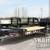 New 7' x 20' Heavy Duty 14K Heavy Equipment Trailer w/ Spring Assi 1 thumbnail