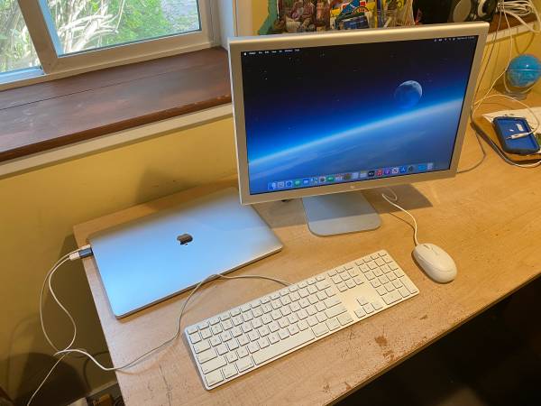 Macbook Pro 2017, desktop setup with monitor and keyboard 1