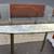 mid-century modern smoked tempered glass dining table brass-toned frame L54”*W 4 thumbnail