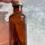 Antique Bottle Small Amber Glass Embossed 3" Tall Metal Lid 1 thumbnail