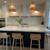 We design and produce custom kitchen cabinets — all under one roof. 9 thumbnail