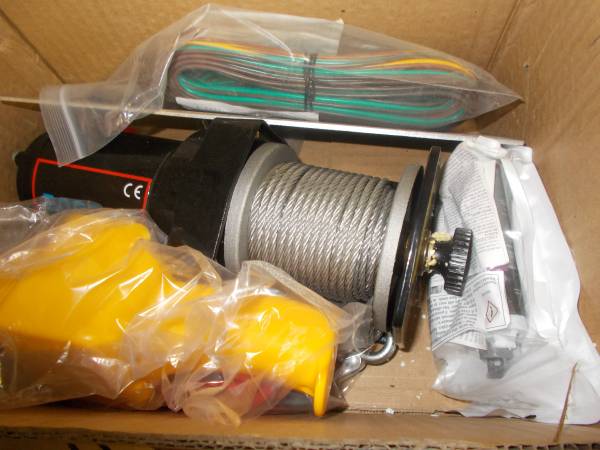 2000 lb. electric winch. 1