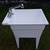 Freestanding utility laundry sink with hot/cold and pull out hose. 3 thumbnail