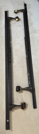 Adjustable Steel bedframe.  Excellent condition. 1