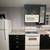 IKEA custom kitchen cabinets, drawers, sink. Some appliances. 1 thumbnail